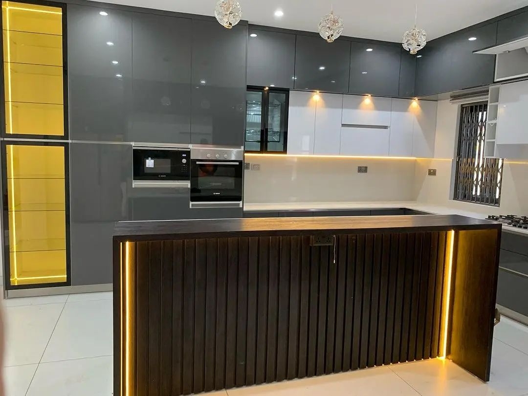 Kitchen cabinet with Island designed, produced and installed by dric interior lagos